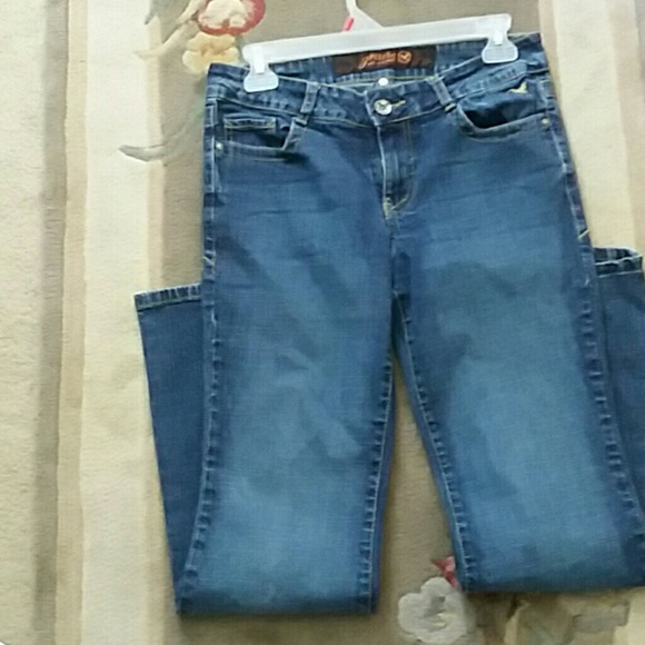 grame Denim - A pair of blue jeans